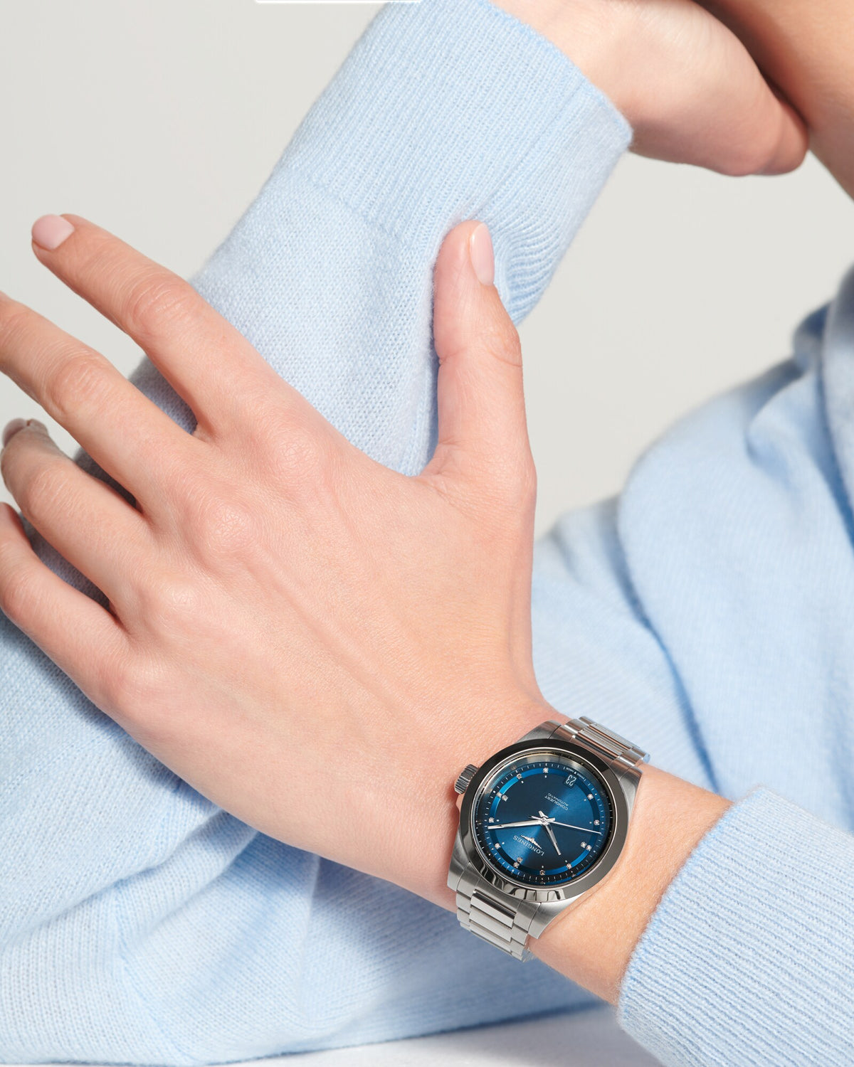[SIMCHA-OFFICIAL-GALLERY:L3.430.4.97.6:10] Longines Conquest 34.00mm Automatic Sunray blue Swiss Super-LumiNova® Dial Stainless Steel Bracelet Watch — official gallery view 10